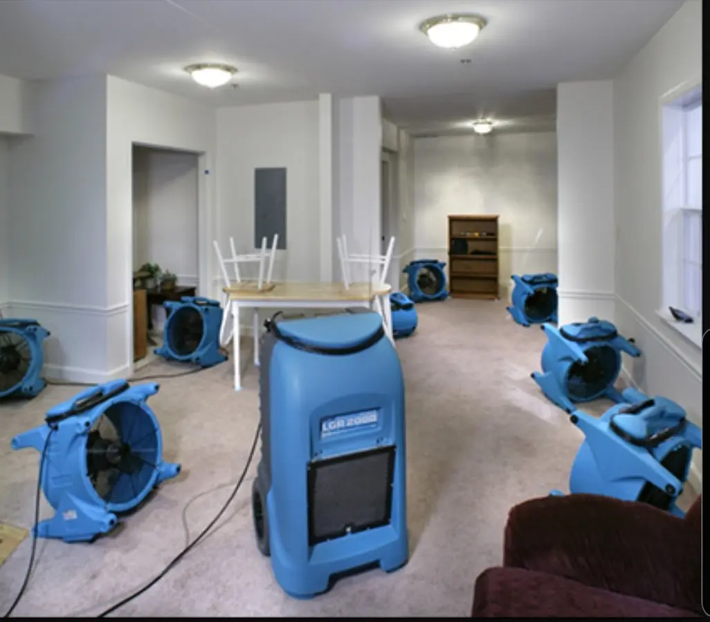 Air movers and dehumidifier setup for Water Damage Restoration in La Presa